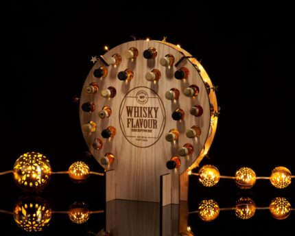 The Whisky Flavour miniature whisky advent calendar is a round wooden structure with 24 expressions in 5cl bottles and many more goodies to experience.