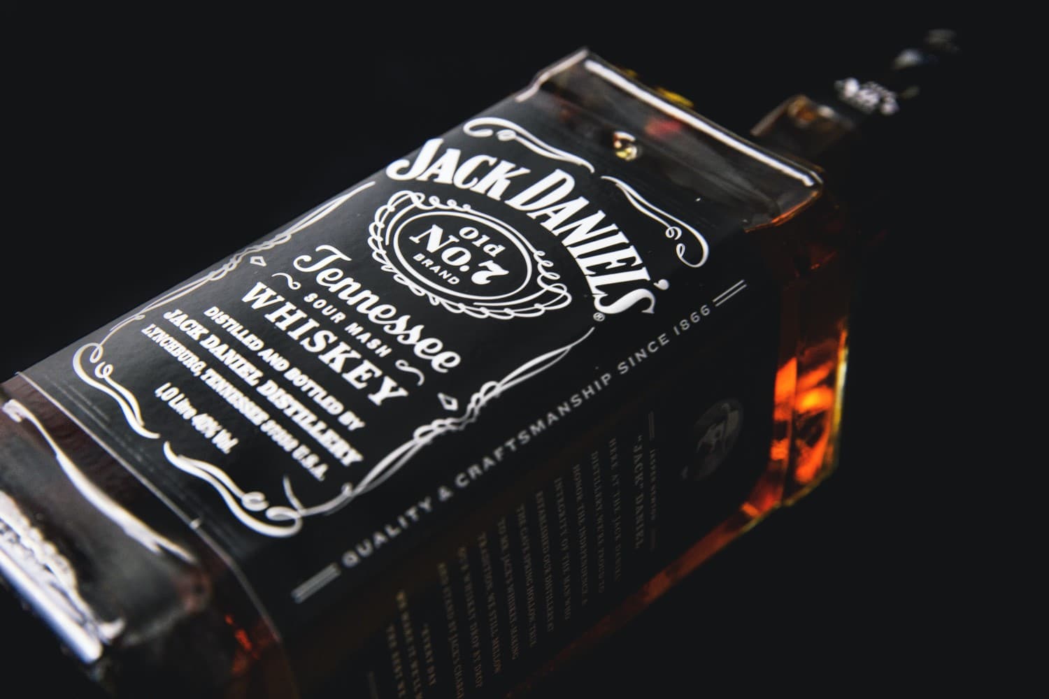 A bottle of Jack Daniels laid down