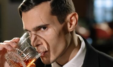 Man sniffing a whisky expression