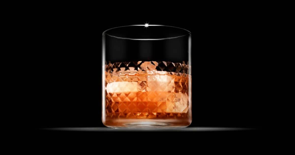 Example of whisky on the rocks in a tumbler glass.